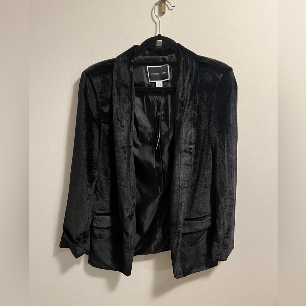 Another story black velvet blazer. Size medium
